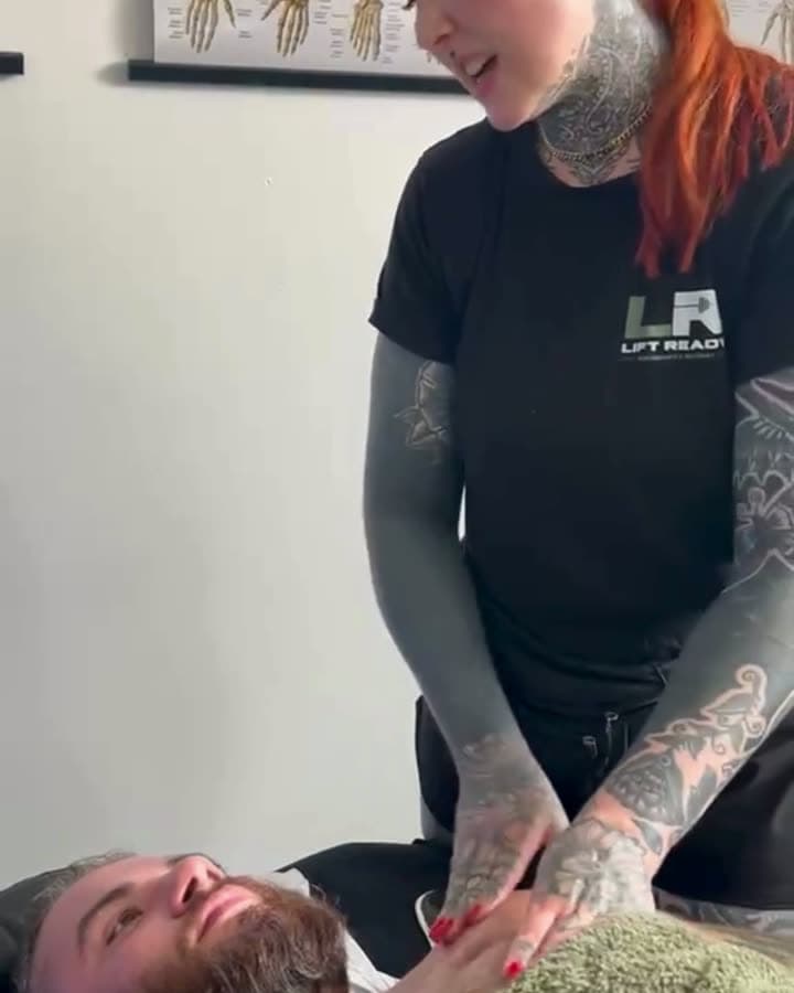 Reel frame: Summer explaining a technique mid-treatment.